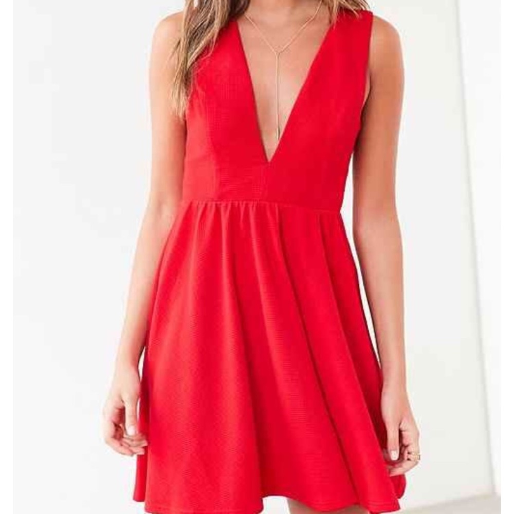 Lucca Couture fit and flare with plunging neckline